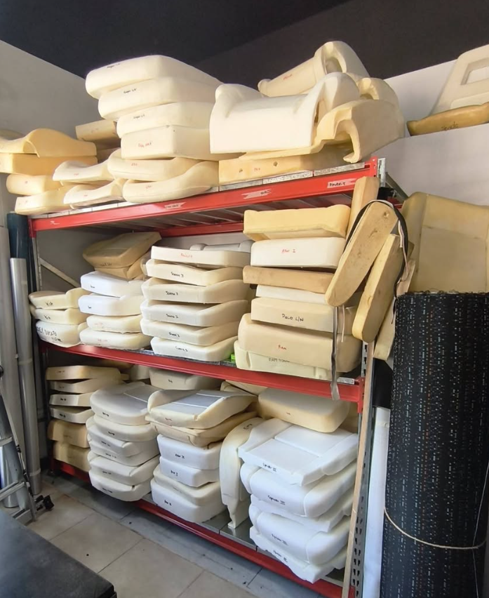 Área de trabajo de M&H Designs para fabricación de fundas, tapicería y equipamiento